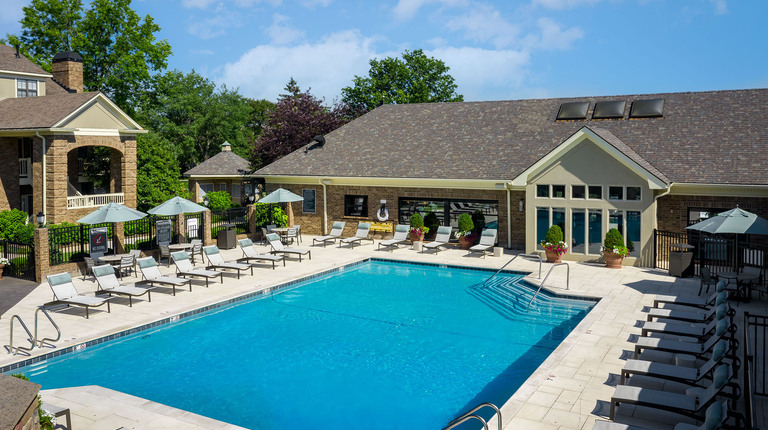 Sparkling Swimming Pool with Lounge Chairs