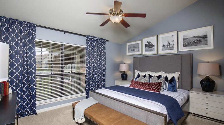 Primary Bedroom with Ceiling Fan and Vaulted Ceiling